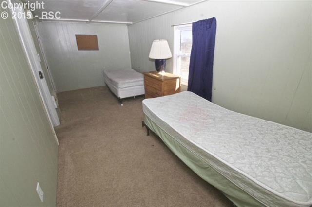 11875 Smith Road Peyton, CO 80831 - Photo 21 of 26 Third bedroom