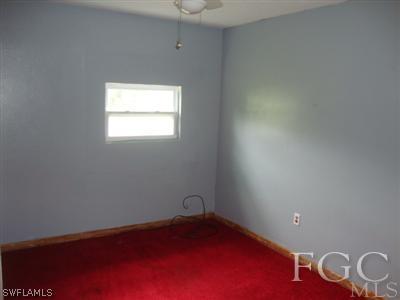 2301 Lotus Road Fort Myers, FL 33905 - Photo 8 of 10 a view of a small space with wooden floor