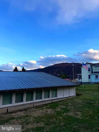 a view of a house with a garden