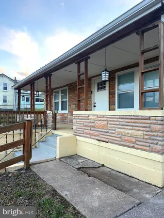 a view of a house with roof deck