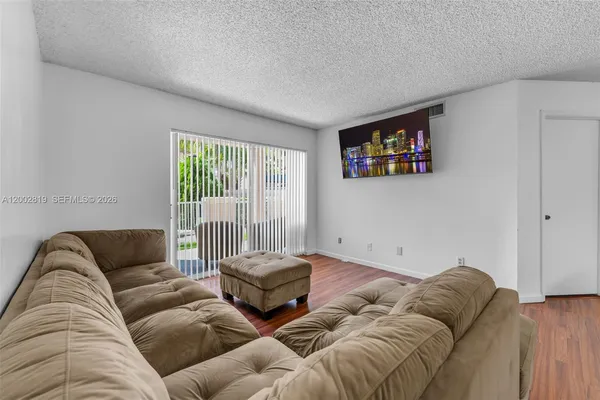 a living room with furniture and a couch