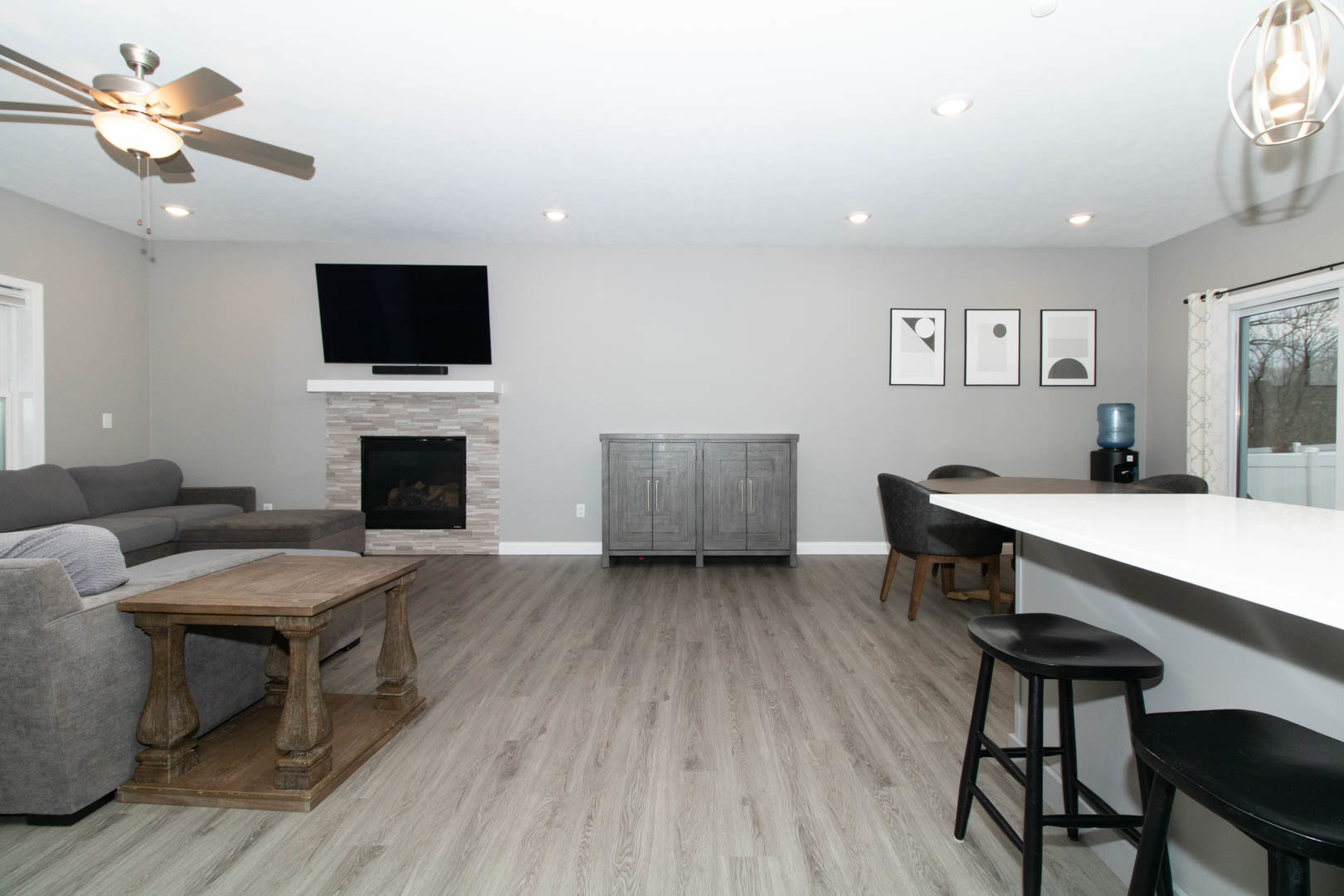 300 Raef Road Downs, IL 61736 - Photo 14 of 47 a living room with furniture and a flat screen tv