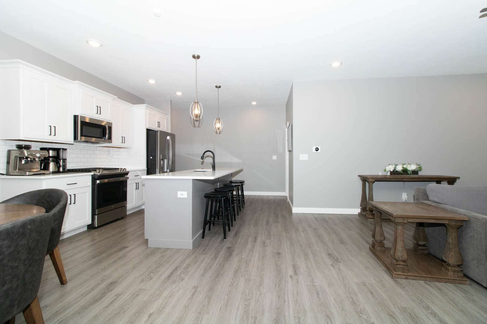 300 Raef Road Downs, IL 61736 - Photo 15 of 47 a view of a dining room with furniture and wooden floor