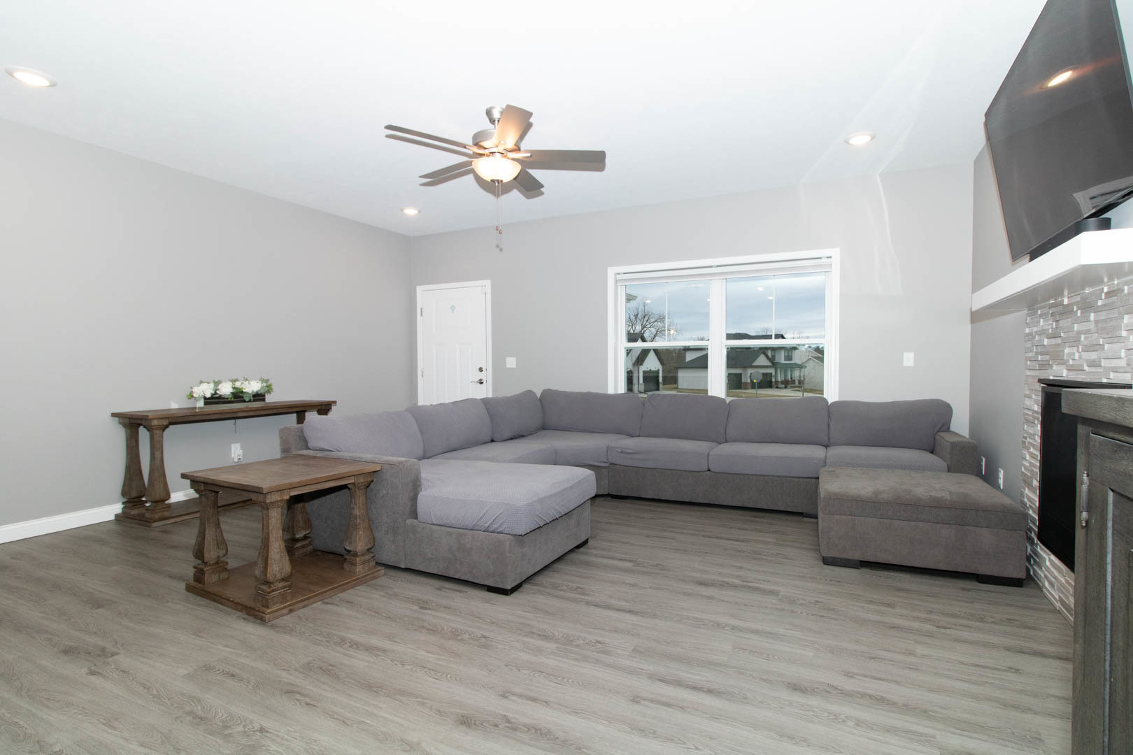 300 Raef Road Downs, IL 61736 - Photo 16 of 47 a living room with furniture and a fireplace