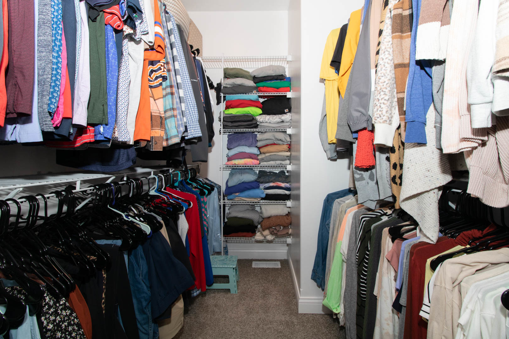 300 Raef Road Downs, IL 61736 - Photo 30 of 47 a view of walk in closet with clothes and shoes