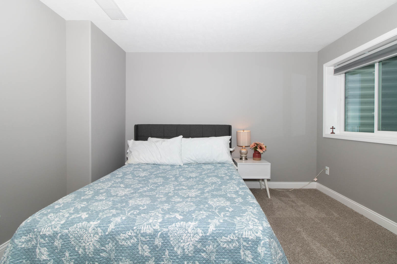 300 Raef Road Downs, IL 61736 - Photo 42 of 47 a large bed sitting in a bedroom next to a window