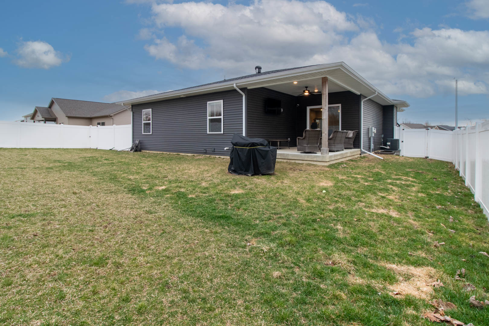 300 Raef Road Downs, IL 61736 - Photo 47 of 47 a view of a house with backyard porch and sitting area