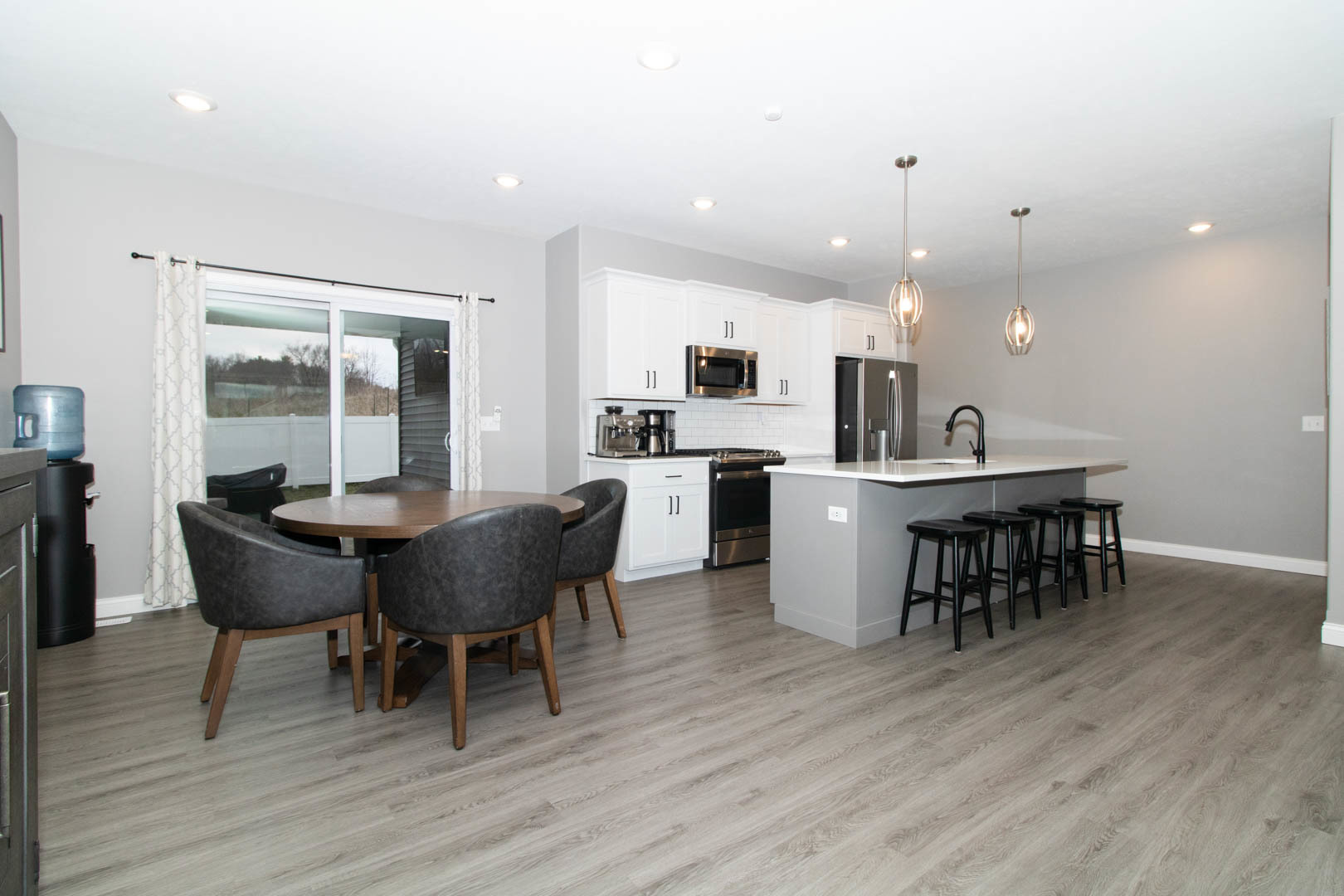 300 Raef Road Downs, IL 61736 - Photo 6 of 47 a dining room with furniture and wooden floor