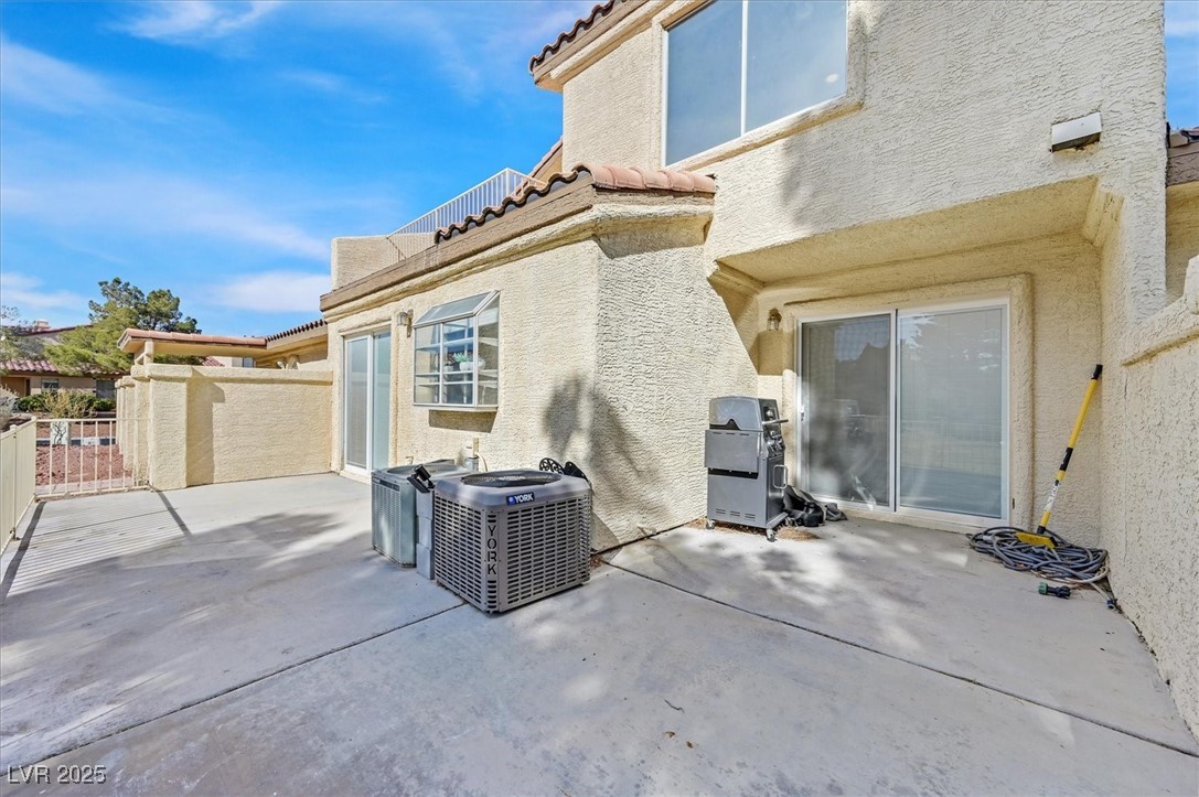 5421 Painted Mirage Road Las Vegas, NV 89149 - Photo 21 of 35 View of patio / terrace with central AC unit