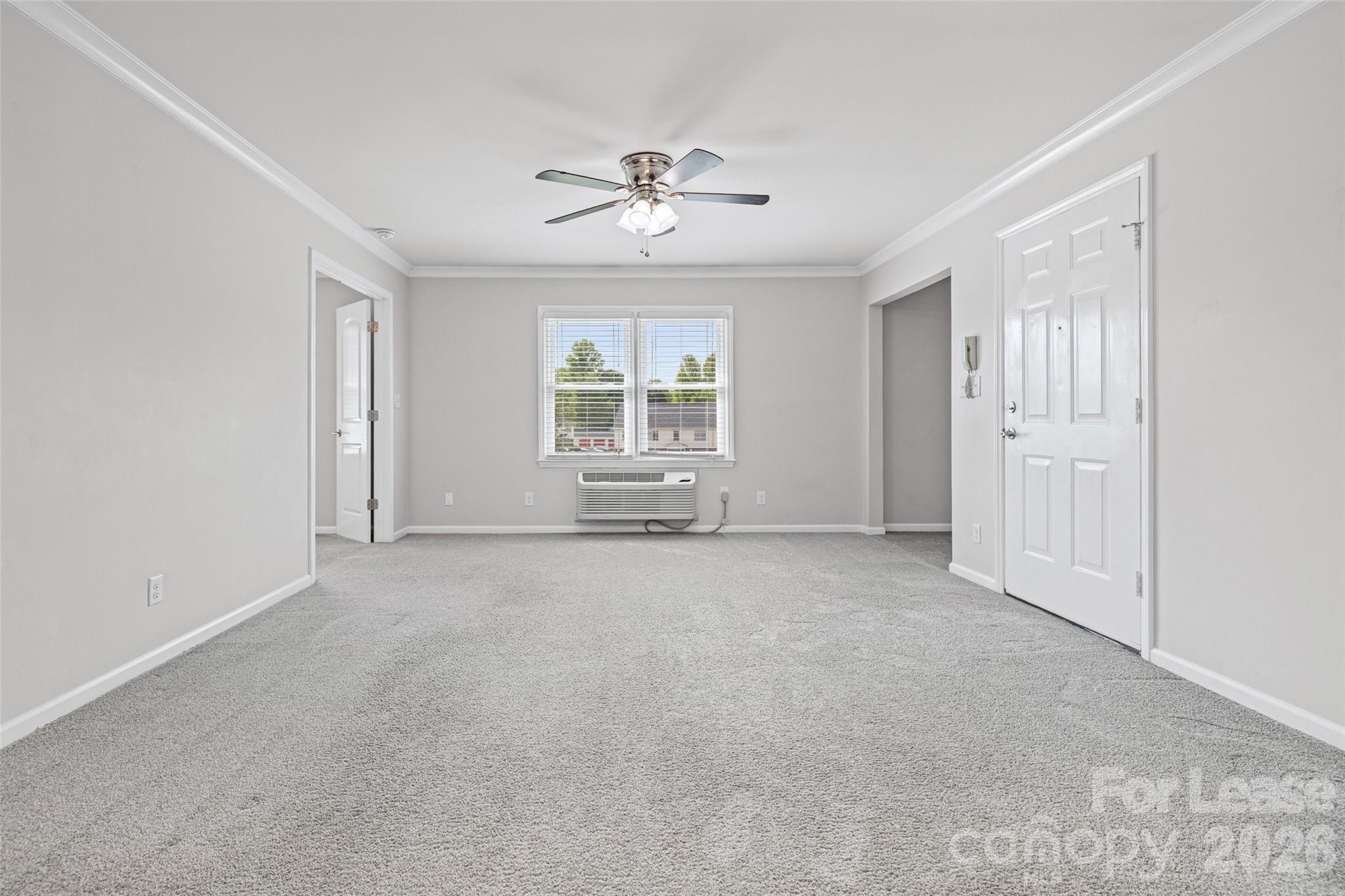 113 Stroupe Road, Unit E Gastonia, NC 28056 - Photo 6 of 33 a view of an empty room with a window