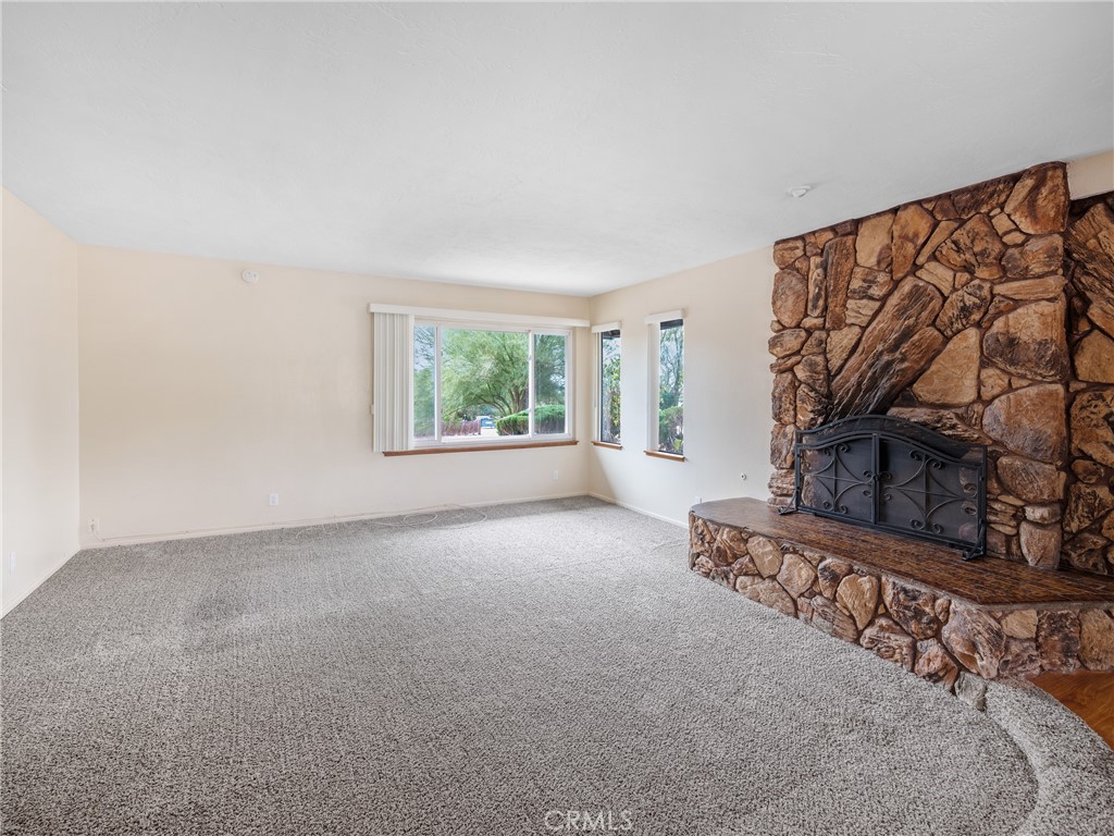 19236 Hupa Road Apple Valley, CA 92307 - Photo 16 of 44 a view of a livingroom with furniture and a window