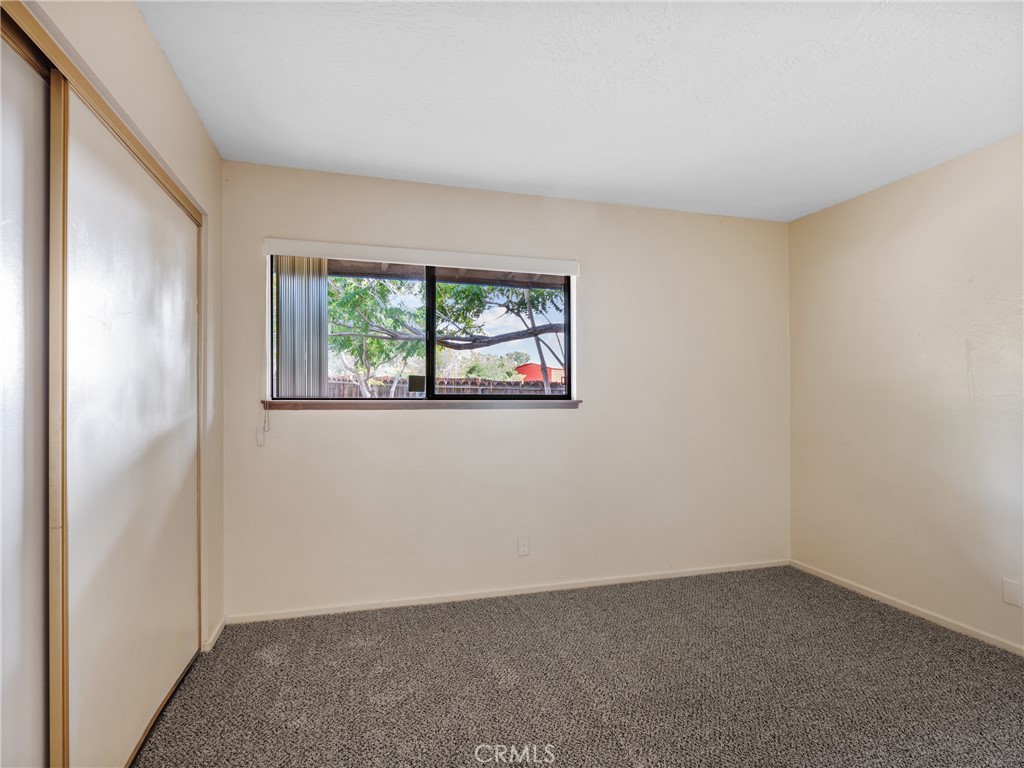 19236 Hupa Road Apple Valley, CA 92307 - Photo 25 of 44 an empty room with windows