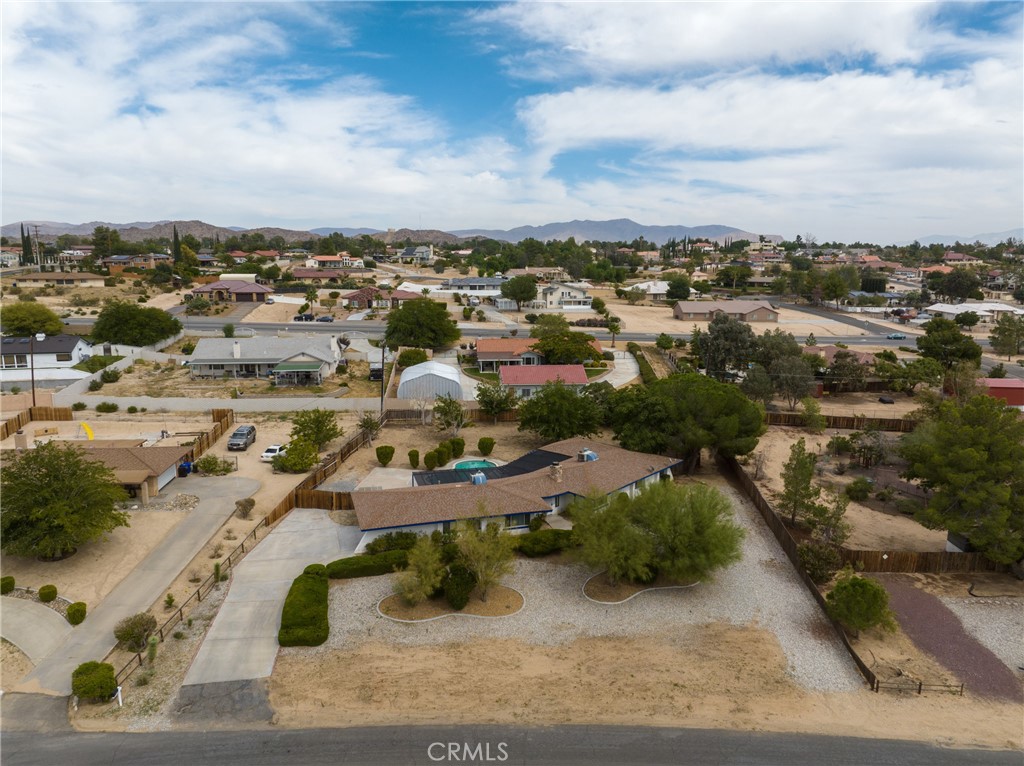 19236 Hupa Road Apple Valley, CA 92307 - Photo 3 of 44 an aerial view of residential houses with city view