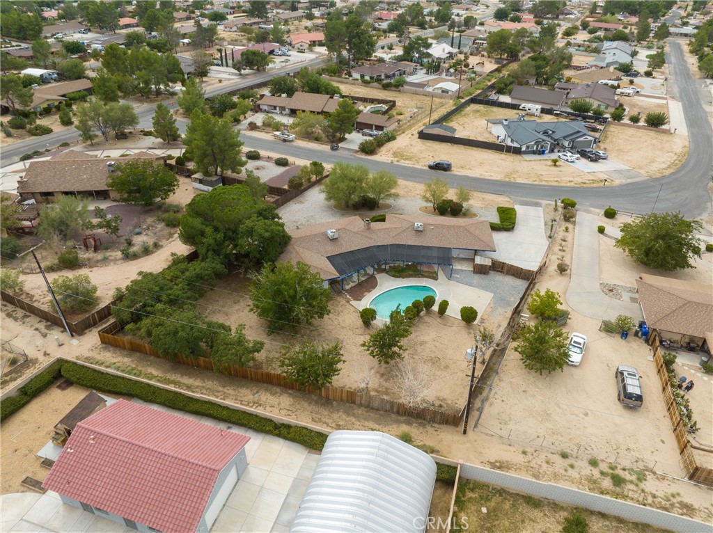 19236 Hupa Road Apple Valley, CA 92307 - Photo 38 of 44 an aerial view of a house with a yard and lake view