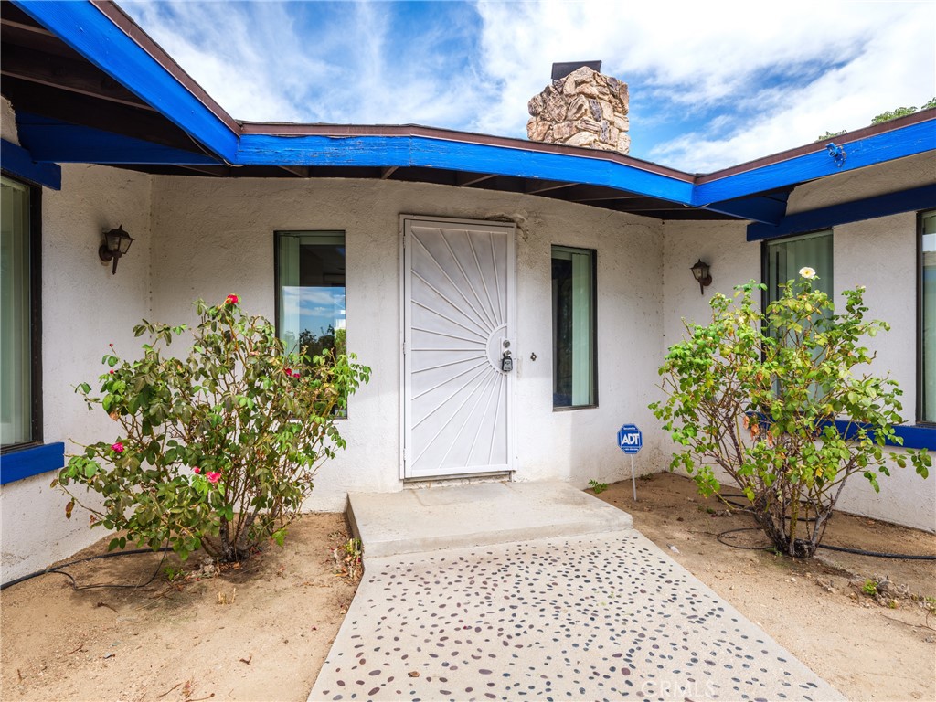 19236 Hupa Road Apple Valley, CA 92307 - Photo 41 of 44 a view of a entryway door of the house