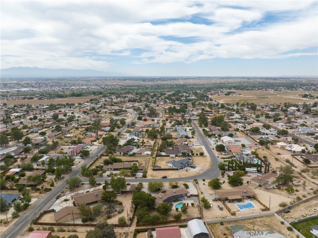 19236 Hupa Road Apple Valley, CA 92307 - Photo 5 of 44 an aerial view of residential building and trees around