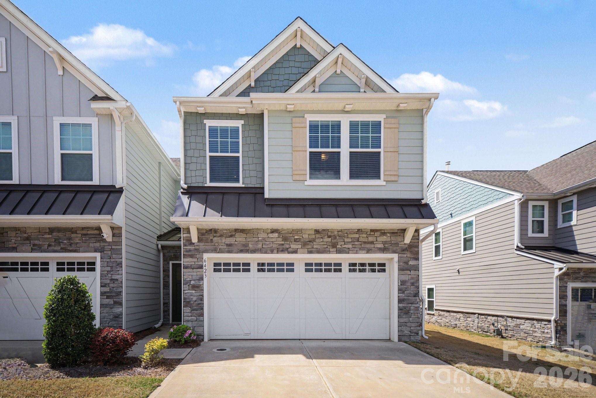 6423 Kinder Lane Lancaster, SC 29720 - Photo 1 of 48 a front view of a house with a yard