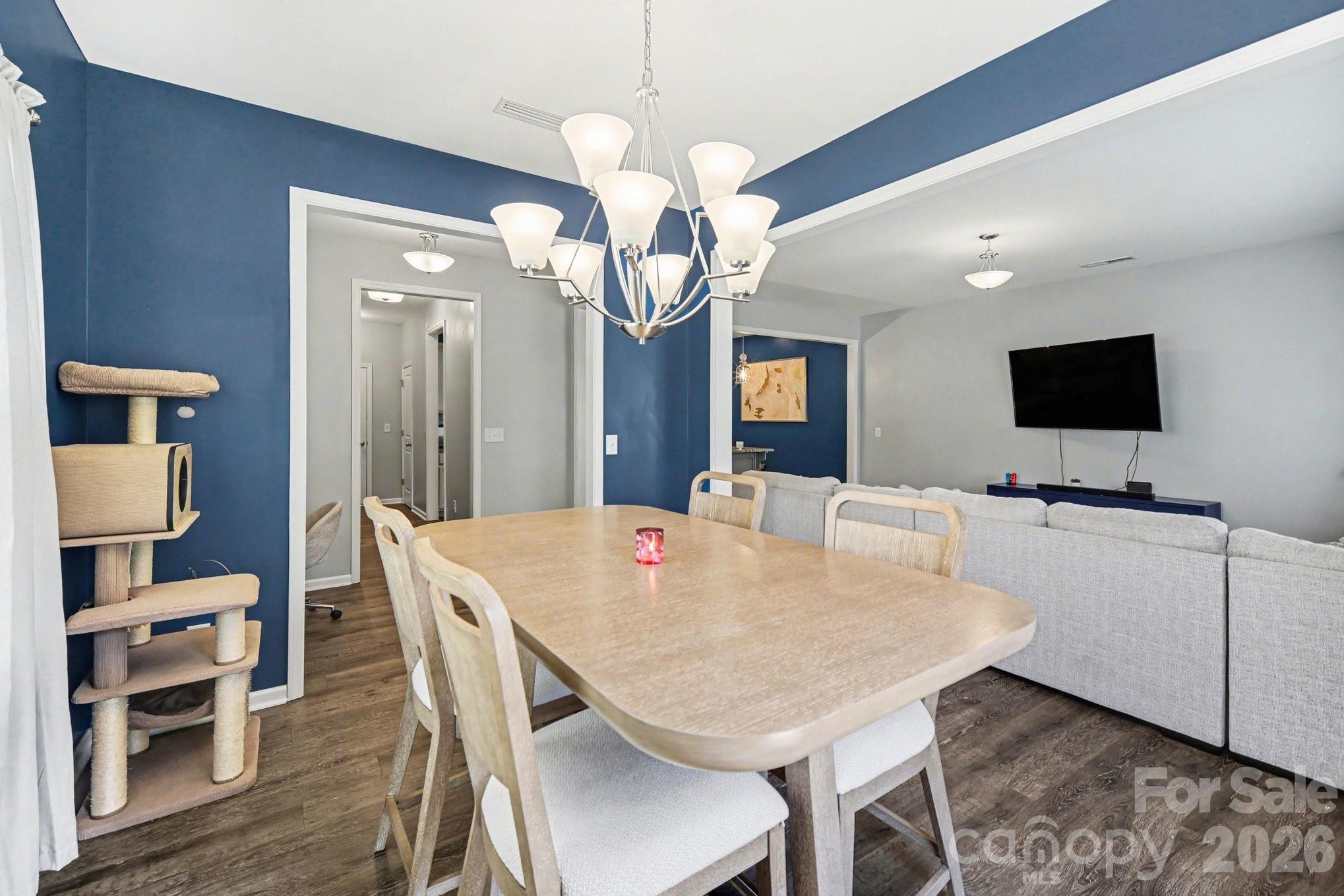 6423 Kinder Lane Lancaster, SC 29720 - Photo 13 of 48 a view of a dining room with furniture and wooden floor