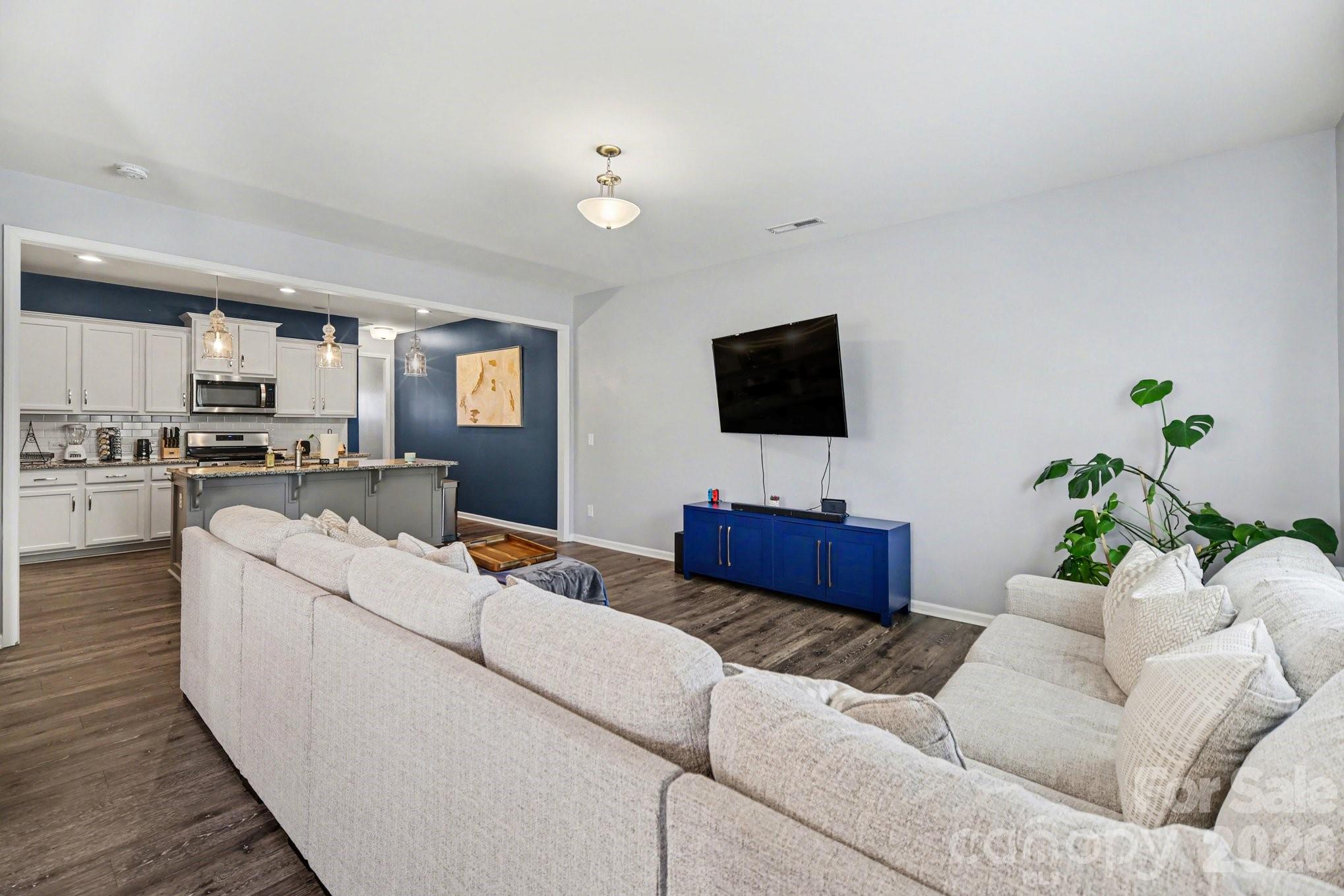 6423 Kinder Lane Lancaster, SC 29720 - Photo 17 of 48 a living room with furniture and a flat screen tv