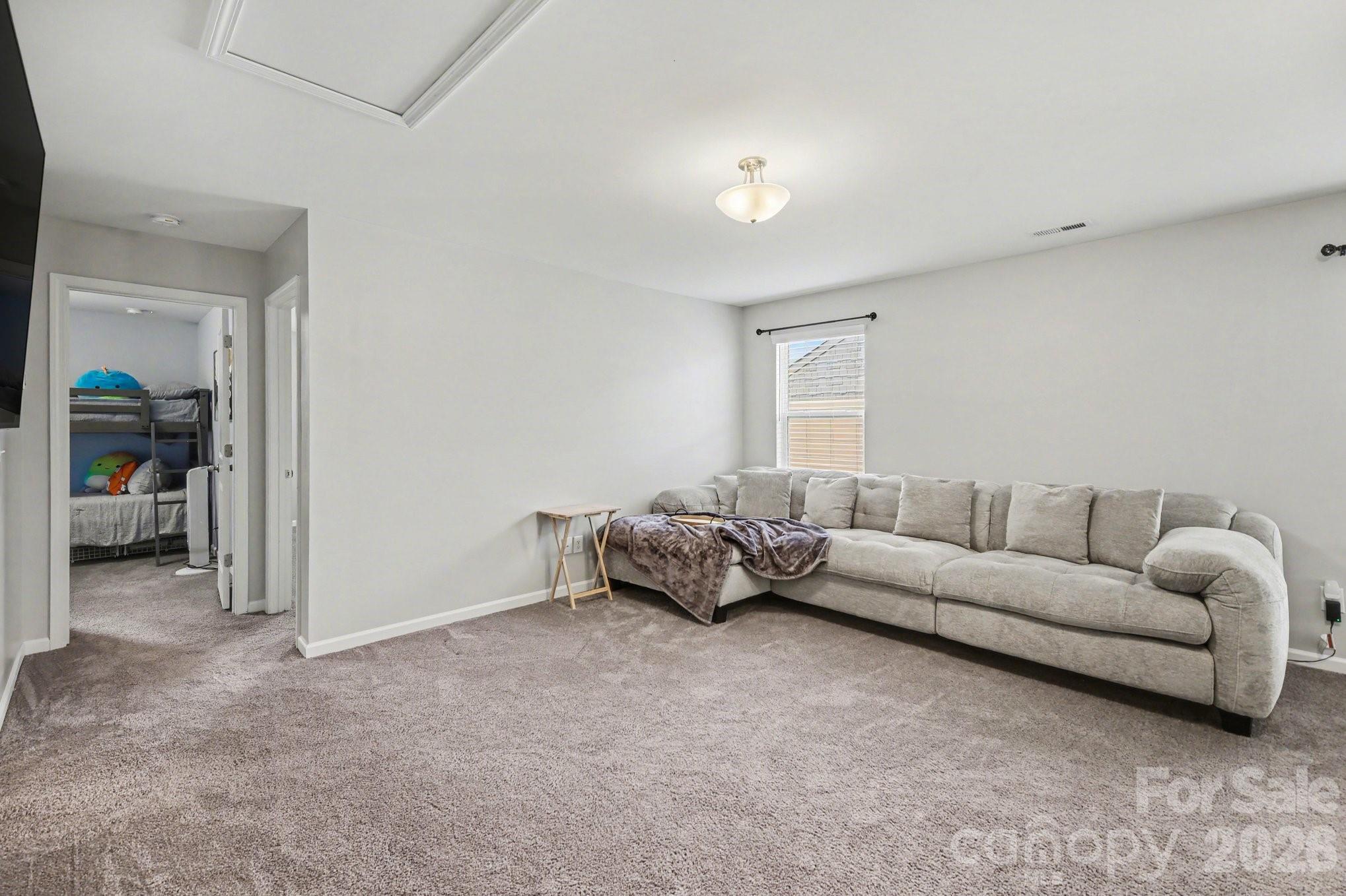 6423 Kinder Lane Lancaster, SC 29720 - Photo 31 of 48 a living room with furniture and a window