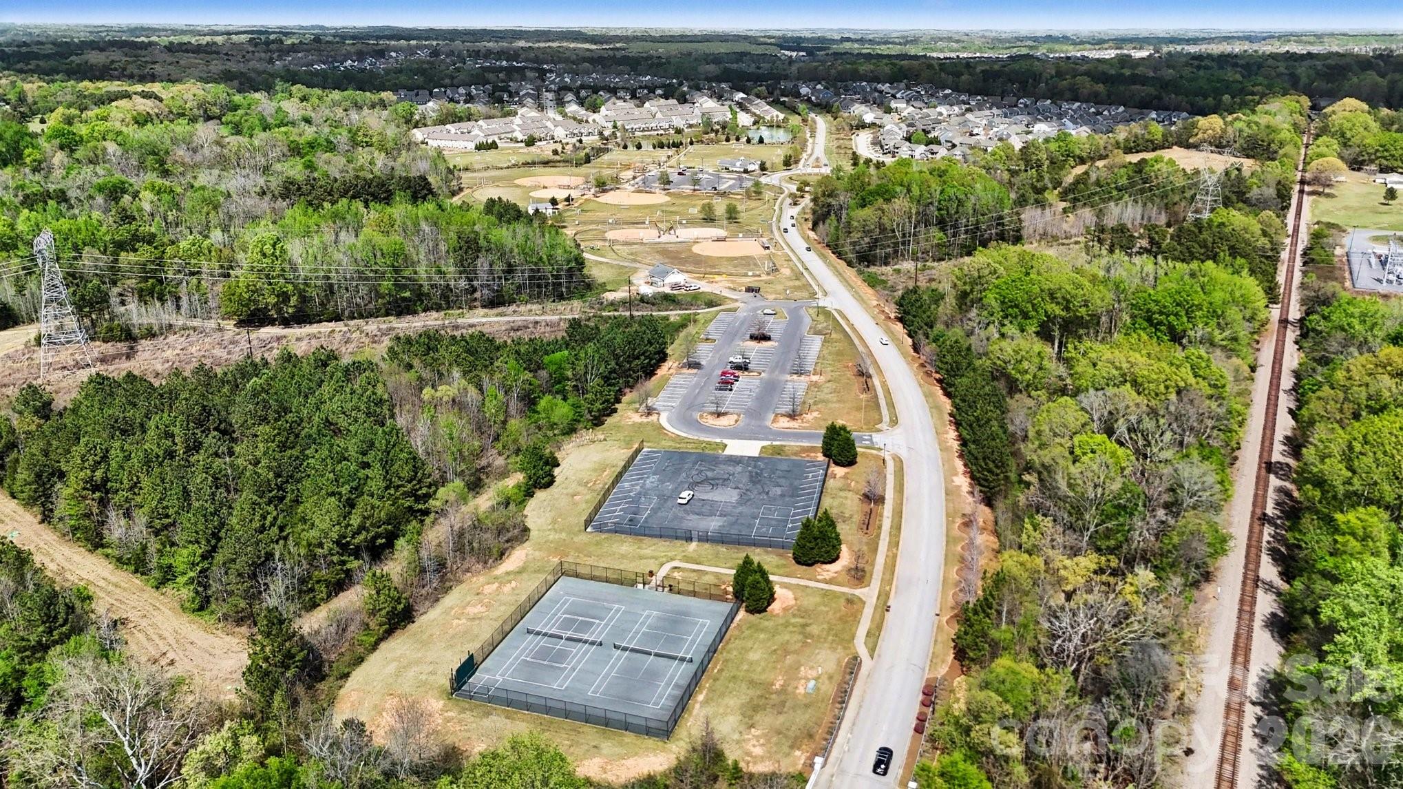 6423 Kinder Lane Lancaster, SC 29720 - Photo 44 of 48 a view of a yard and front view of a lake view