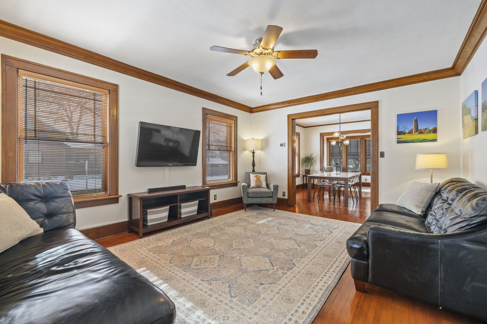 603 North Brainard Street Naperville, IL 60563 - Photo 12 of 44 a living room with furniture and a flat screen tv with wooden floor