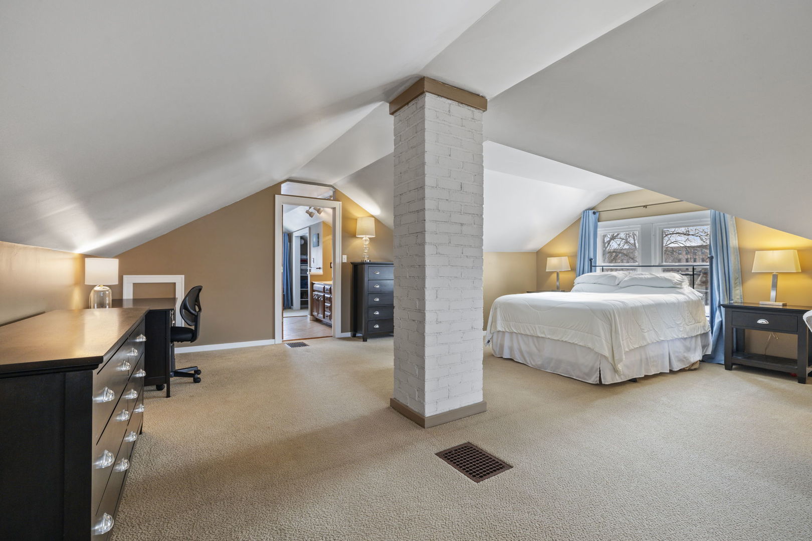 603 North Brainard Street Naperville, IL 60563 - Photo 23 of 44 a spacious bedroom with a bed and a desk