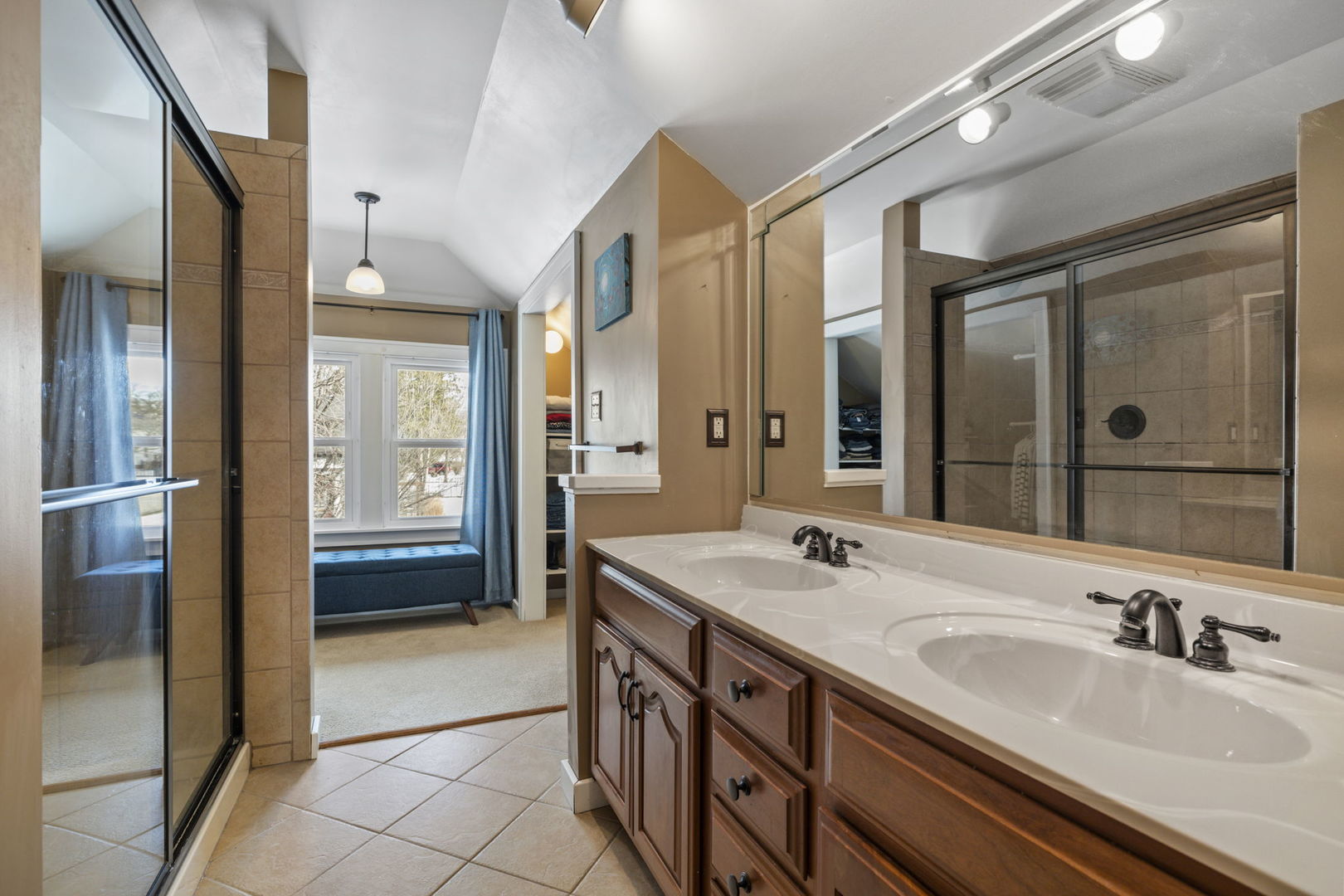 603 North Brainard Street Naperville, IL 60563 - Photo 25 of 44 a bathroom with a sink double vanity and a mirror