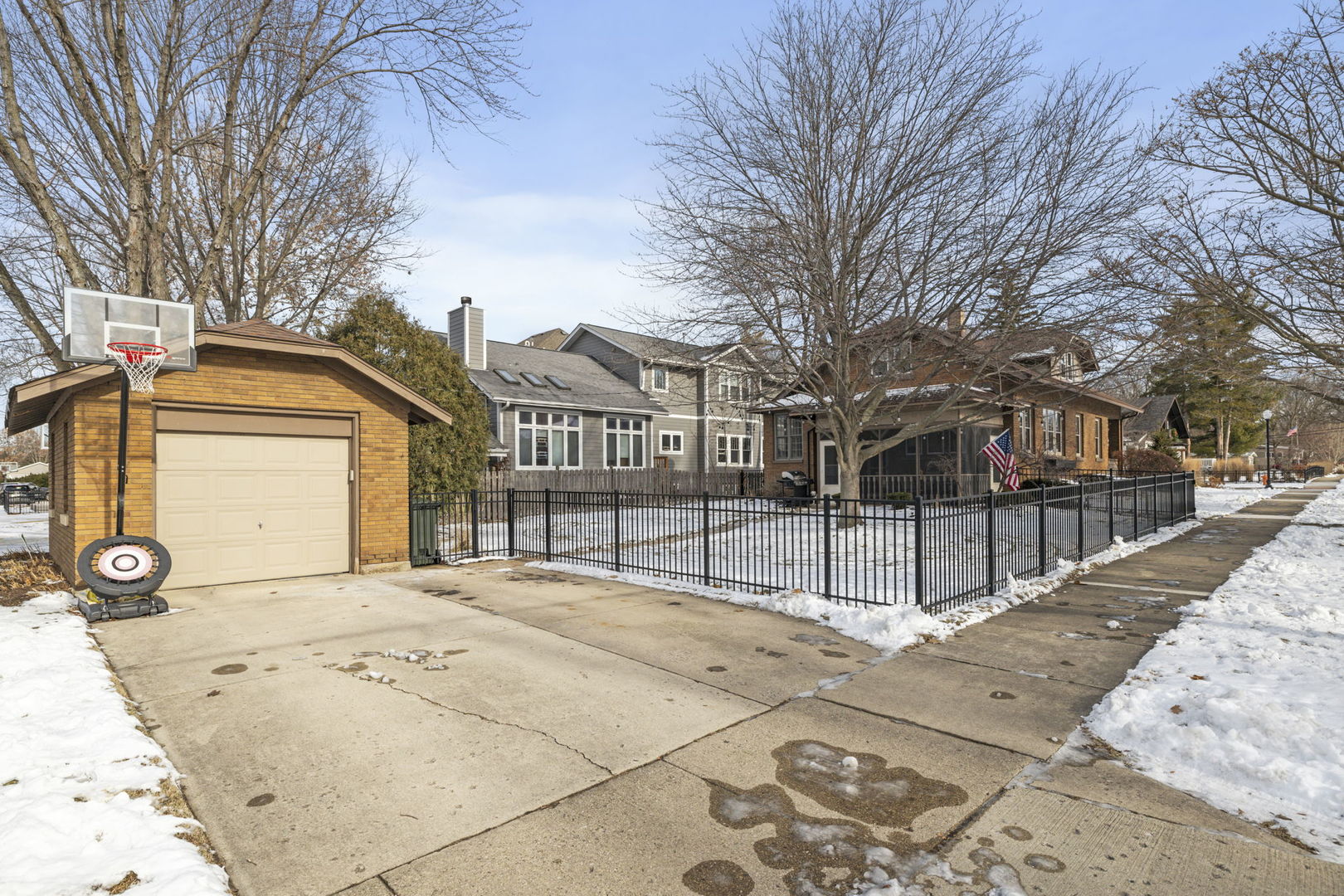 603 North Brainard Street Naperville, IL 60563 - Photo 7 of 44 a view of a house with a snow on the road