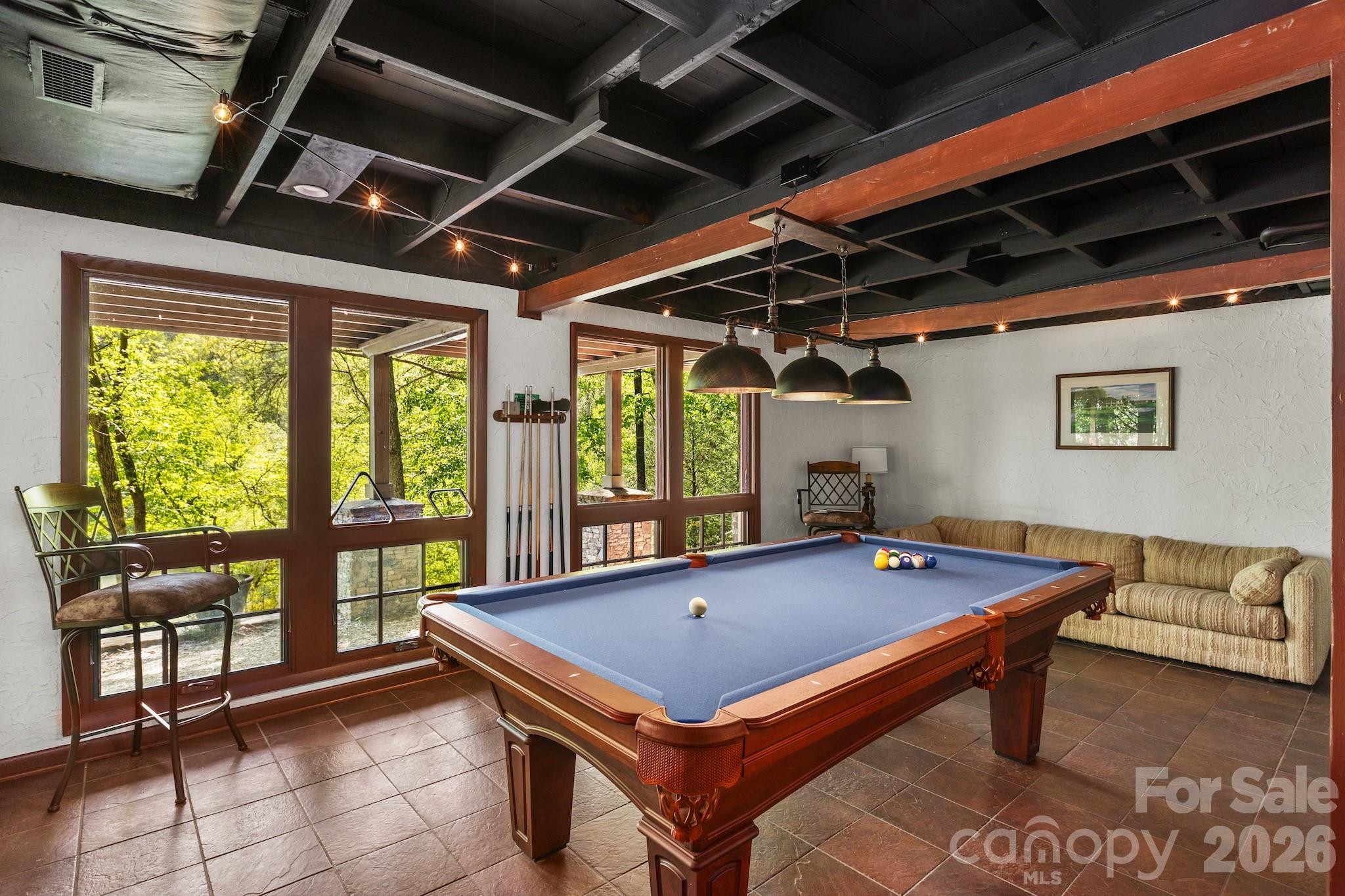 1971 Buffalo Creek Road Lake Lure, NC 28746 - Photo 22 of 31 a room with pool table and windows