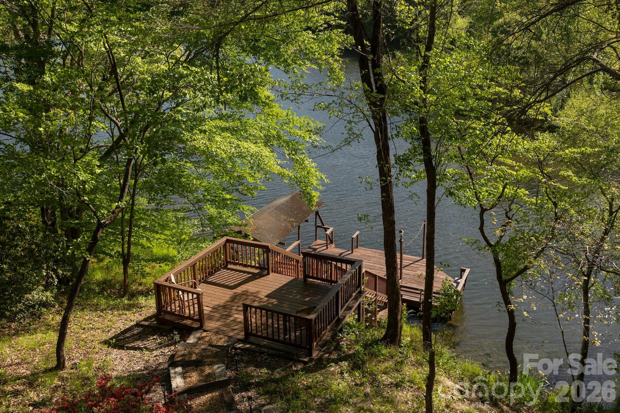 1971 Buffalo Creek Road Lake Lure, NC 28746 - Photo 28 of 31 a view of a backyard with chairs