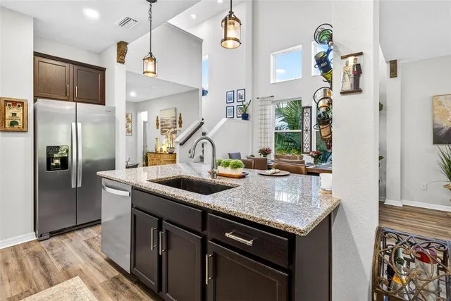 a view of a dining room with furniture window and outside view