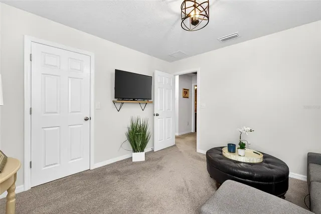 an aerial view of a pool yard swimming pool and outdoor seating