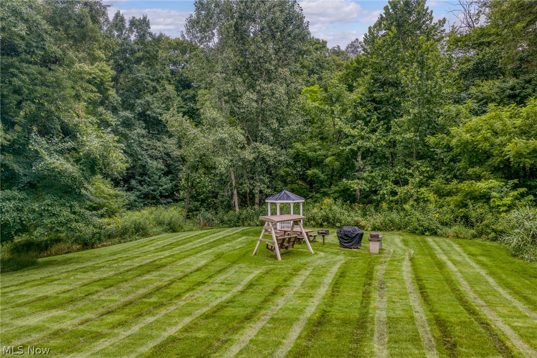 3070 Kent Road, Unit 312D Stow, OH 44224 - Photo 46 of 49 Expansive green lawn with striped mowing pattern