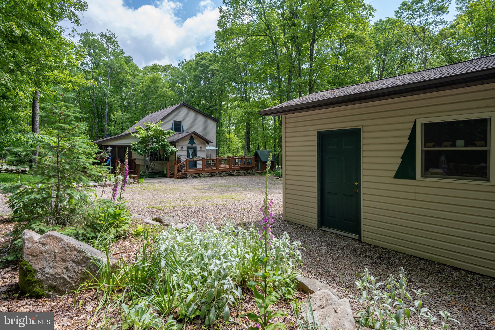 328 Stool Rock Road Oakland, MD 21550 - Photo 31 of 133 a view of a back yard of the house