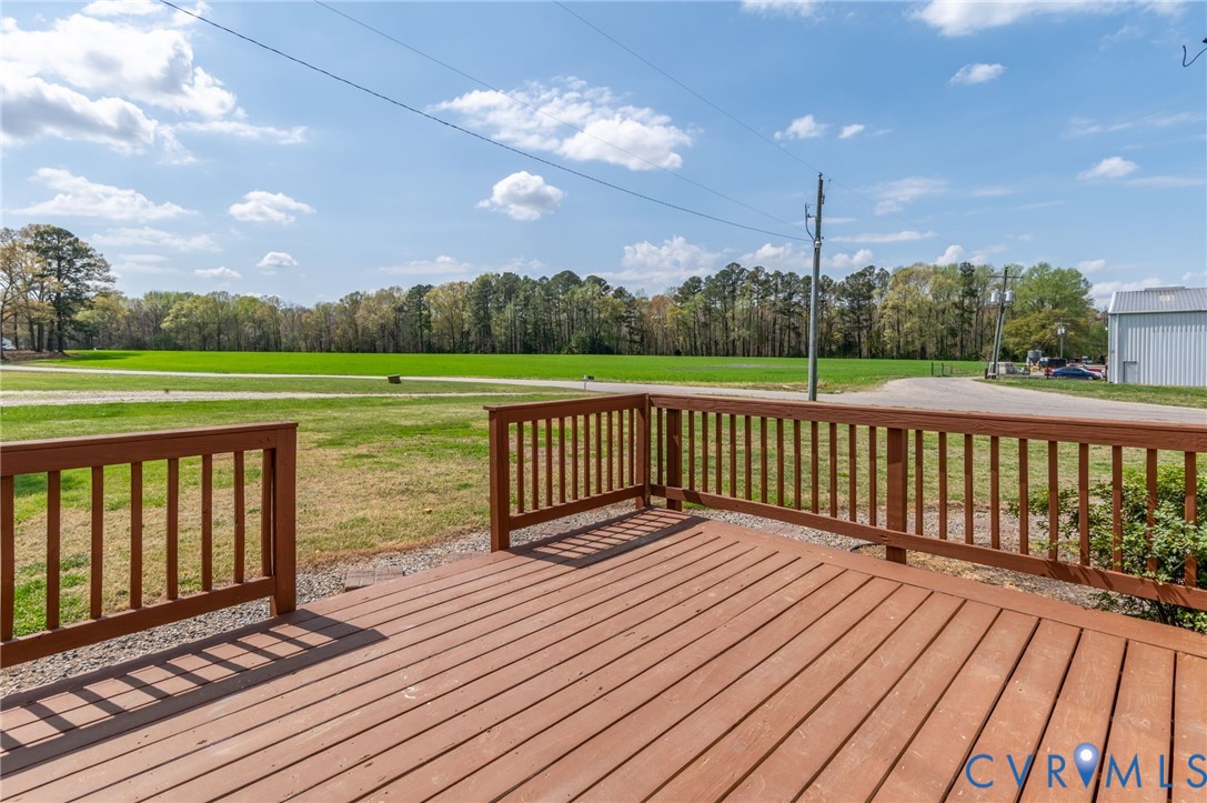 9711 Robin Road Disputanta, VA 23842 - Photo 10 of 29 a view of deck with patio