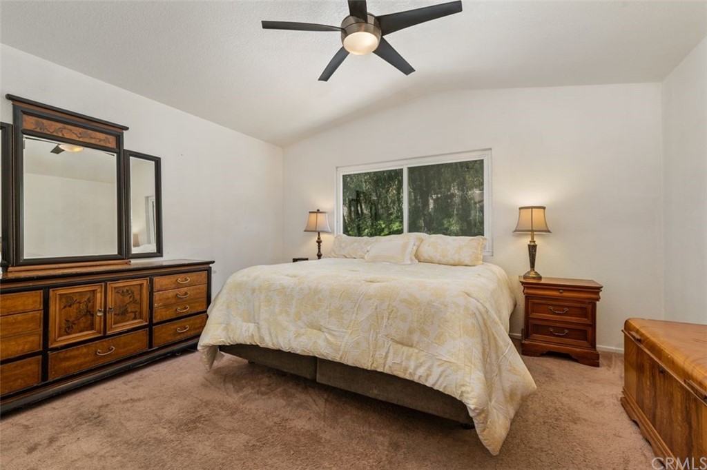 28825 Woodspring Circle Lake Forest, CA 92679 - Photo 18 of 50 a bedroom with a bed next to a window