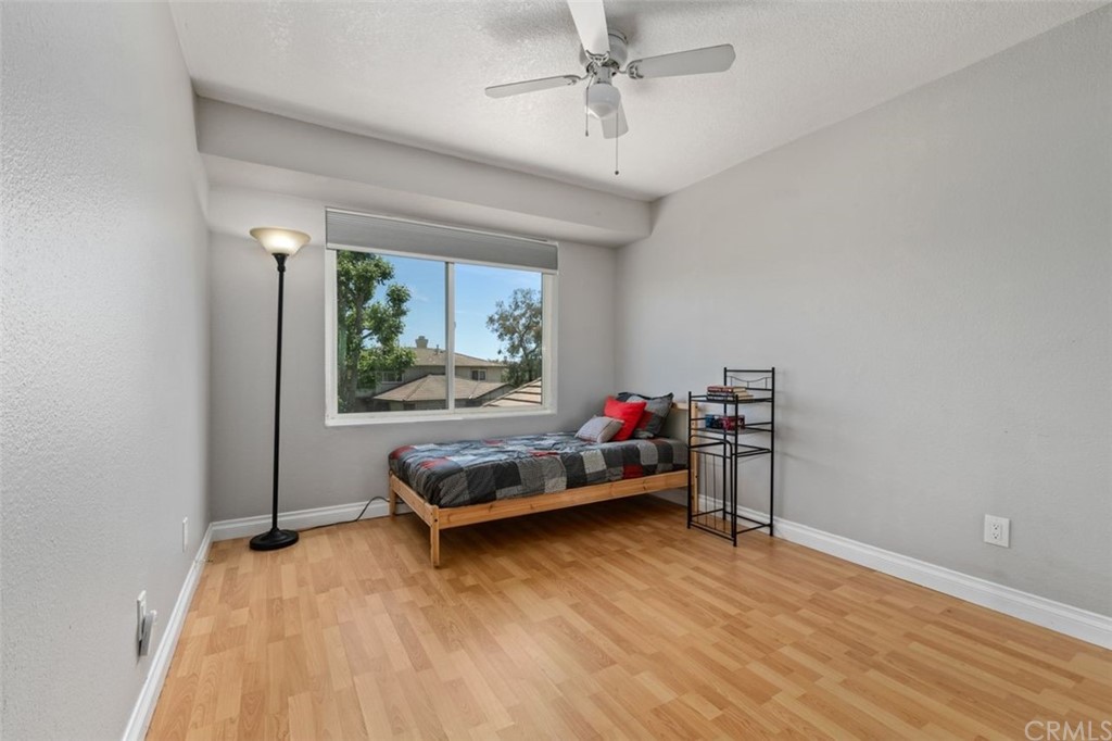 28825 Woodspring Circle Lake Forest, CA 92679 - Photo 24 of 50 a living room with furniture and a wooden floor