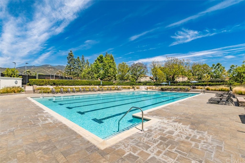28825 Woodspring Circle Lake Forest, CA 92679 - Photo 35 of 50 a view of swimming pool with outdoor seating and yard in back