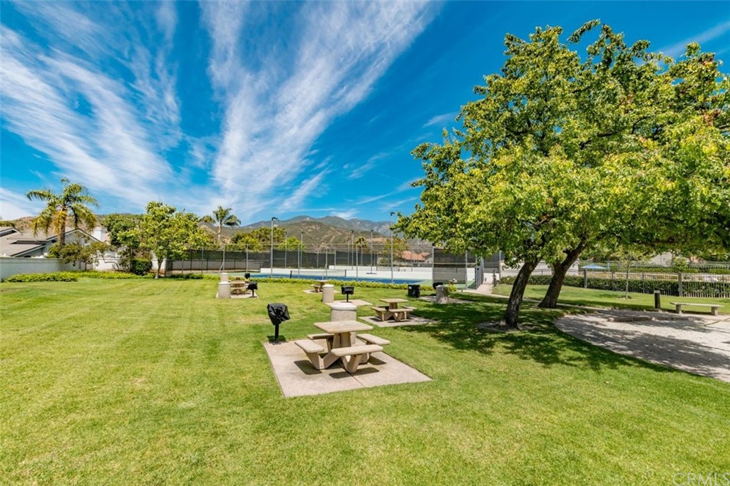28825 Woodspring Circle Lake Forest, CA 92679 - Photo 38 of 50 a view of a swimming pool with a patio