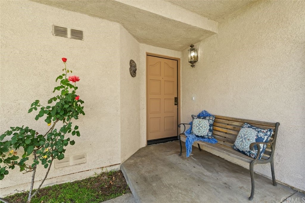28825 Woodspring Circle Lake Forest, CA 92679 - Photo 4 of 50 a bench sitting in a room next to a window
