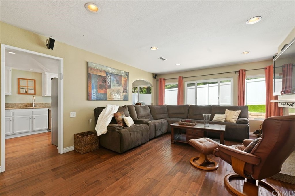 28825 Woodspring Circle Lake Forest, CA 92679 - Photo 8 of 50 a living room with furniture and a large window