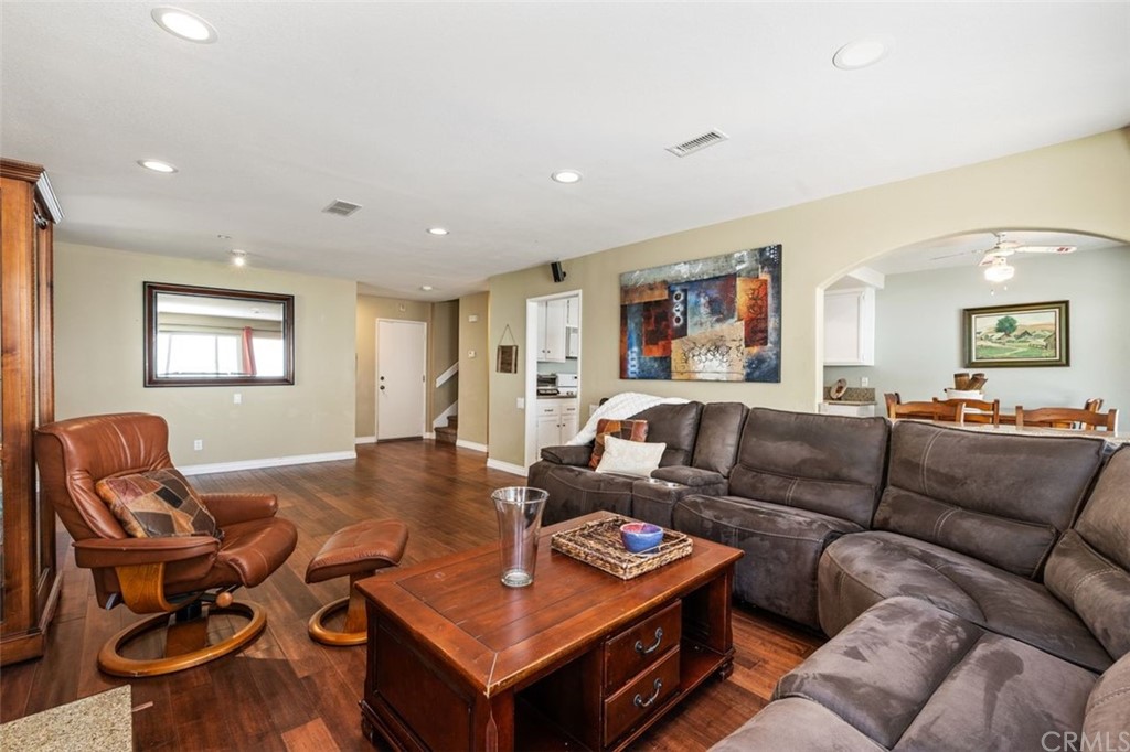 28825 Woodspring Circle Lake Forest, CA 92679 - Photo 9 of 50 a living room with furniture a rug and a window
