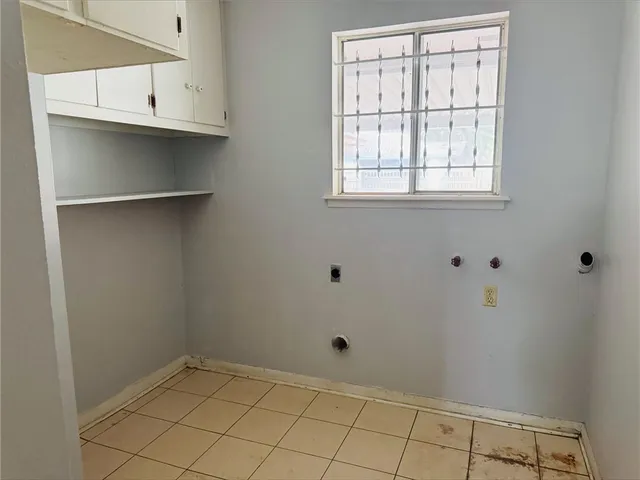 a view of a backyard with a garden and plants