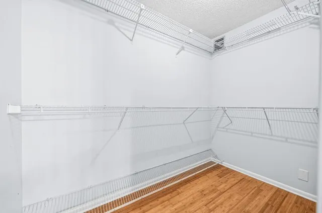 a view of a room with racks on the wall