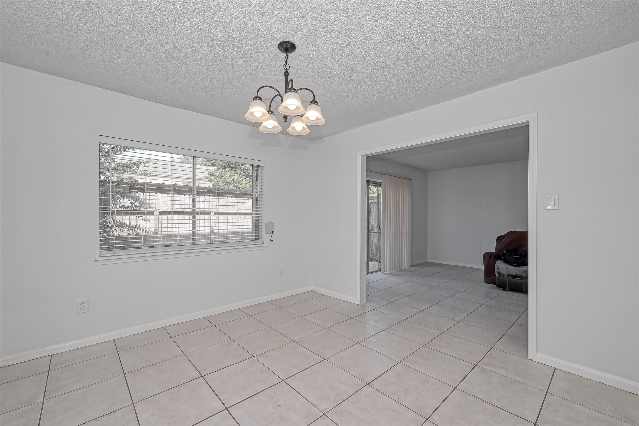 14179 Misty Meadow Lane Houston, TX 77079 - Photo 22 of 41 a view of an empty room with a window