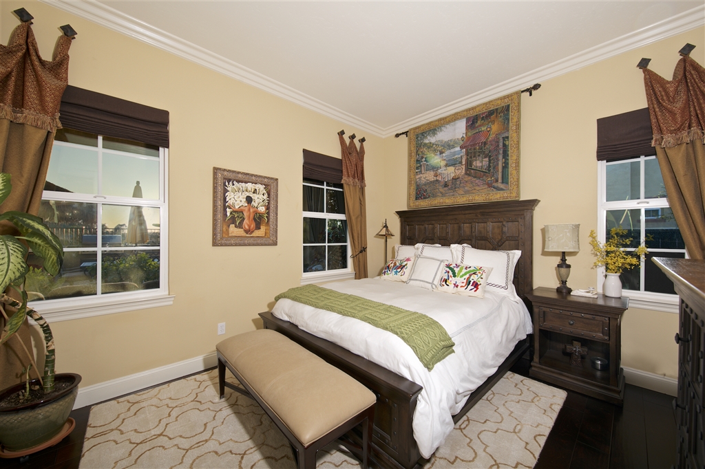 2436 Lapis Road Carlsbad, CA 92009 - Photo 19 of 25 Downstairs bedroom with large private bath boasting custom tile work and Bio Bidet
