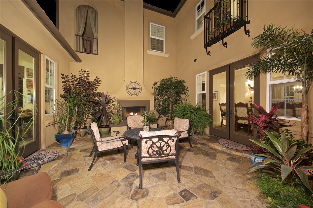 2436 Lapis Road Carlsbad, CA 92009 - Photo 4 of 25 Tranquil courtyard opening up to entry way, bonus room and dinning room.