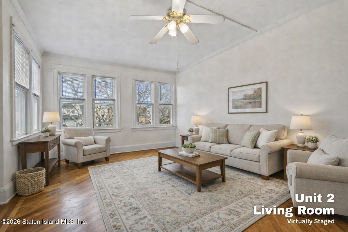 116 Silver Lake Road Staten Island, NY 10301 - Photo 18 of 36 a living room with furniture and a large window