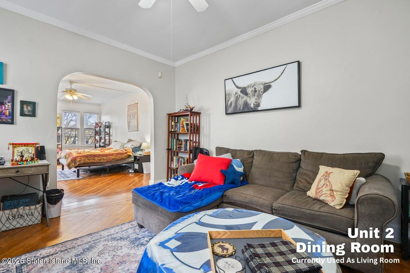 116 Silver Lake Road Staten Island, NY 10301 - Photo 20 of 36 a living room with furniture or couch and a dining table